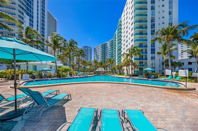 view of swimming pool featuring a patio