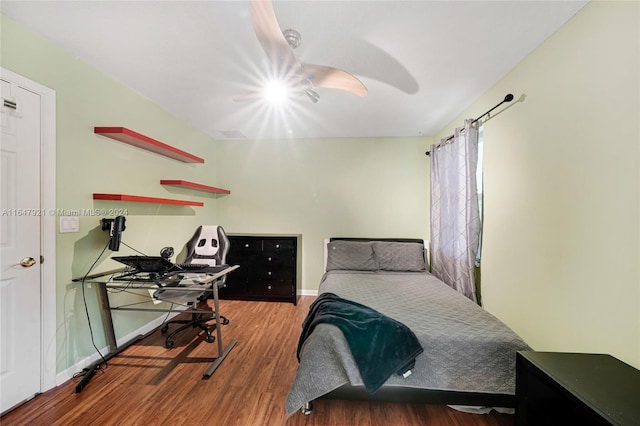 bedroom with wood-type flooring