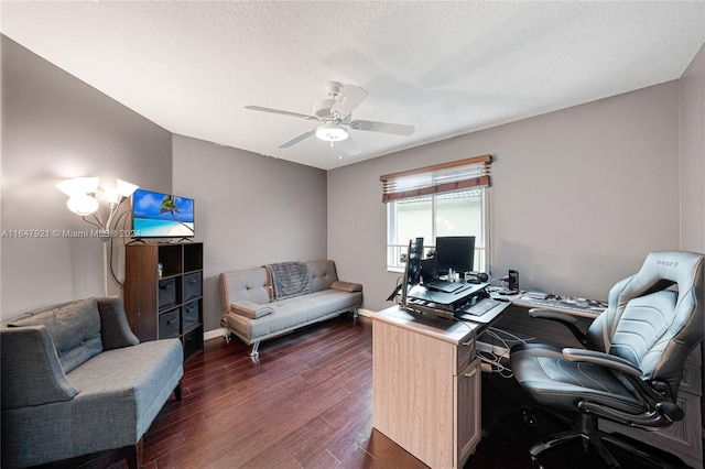 home office with ceiling fan, a textured ceiling, and dark wood-type flooring