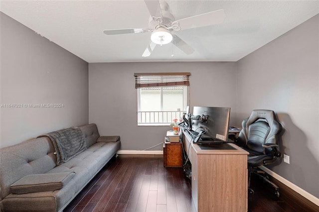 office space with ceiling fan and dark wood-type flooring