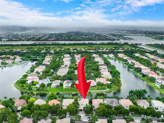 bird's eye view with a water view