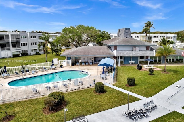 view of swimming pool featuring a patio