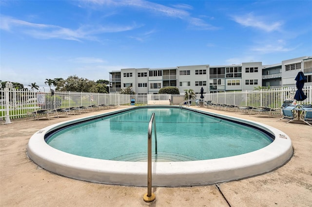 view of pool featuring a patio