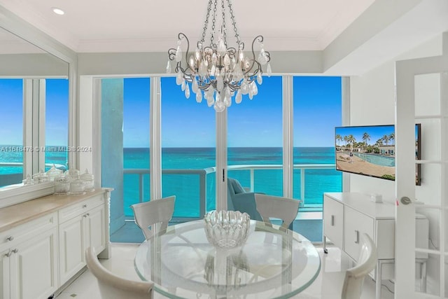 sunroom / solarium featuring a notable chandelier