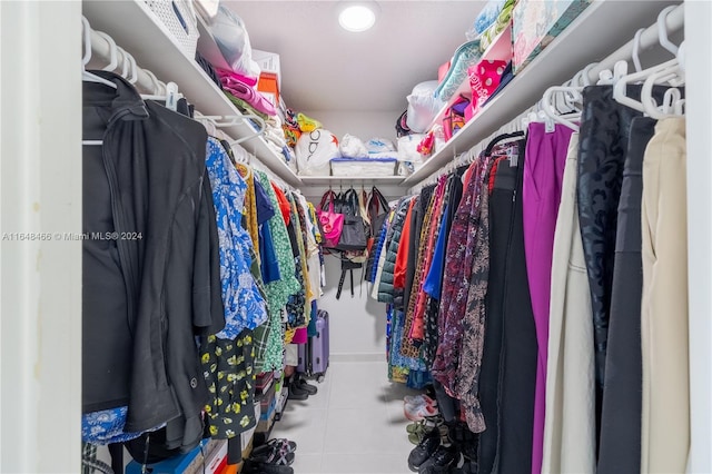 walk in closet featuring tile patterned floors