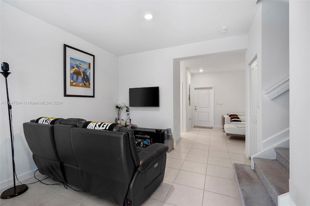 living room featuring light tile patterned flooring