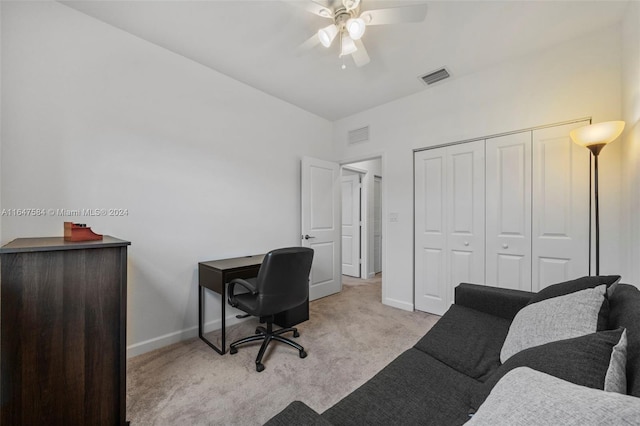 office area featuring ceiling fan and light colored carpet