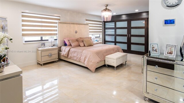 8886 NW 187th St, Miami, FL 33018 - bedroom featuring baseboards