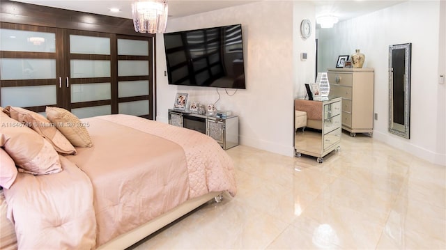 8886 NW 187th St, Miami, FL 33018 - bedroom with marble finish floor, an inviting chandelier, and baseboards