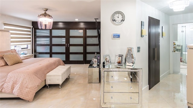 8886 NW 187th St, Miami, FL 33018 - bedroom with an inviting chandelier and baseboards
