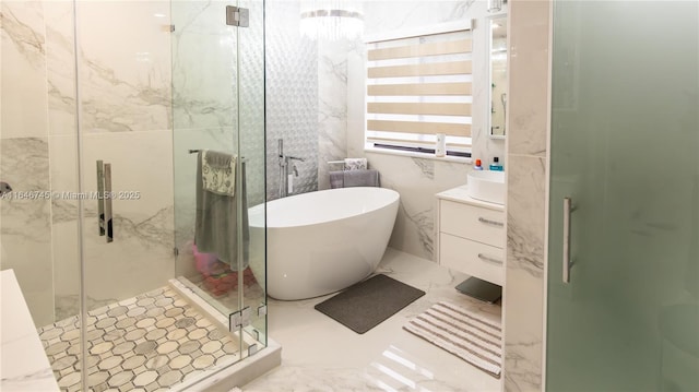 8886 NW 187th St, Miami, FL 33018 - full bath featuring a soaking tub, marble finish floor, vanity, and a marble finish shower