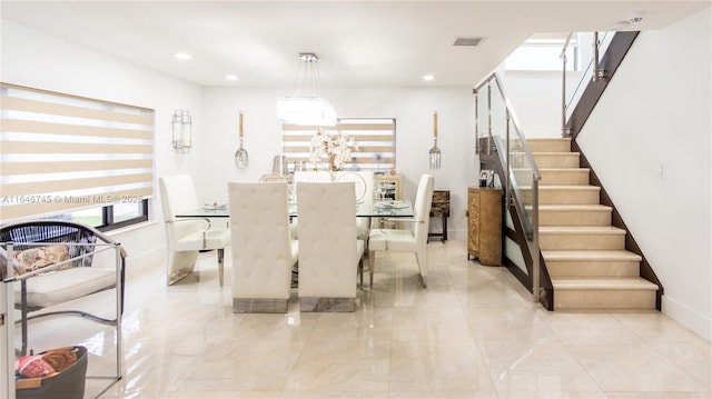 8886 NW 187th St, Miami, FL 33018 - dining space featuring visible vents, baseboards, recessed lighting, and stairs