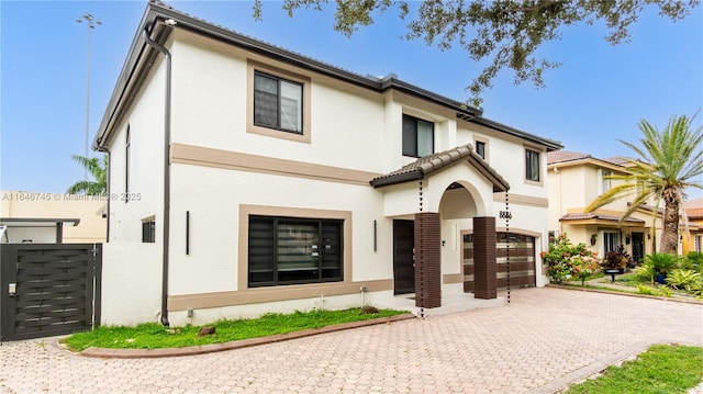 8886 NW 187th St, Miami, FL 33018 - view of front of home featuring stucco siding and decorative driveway