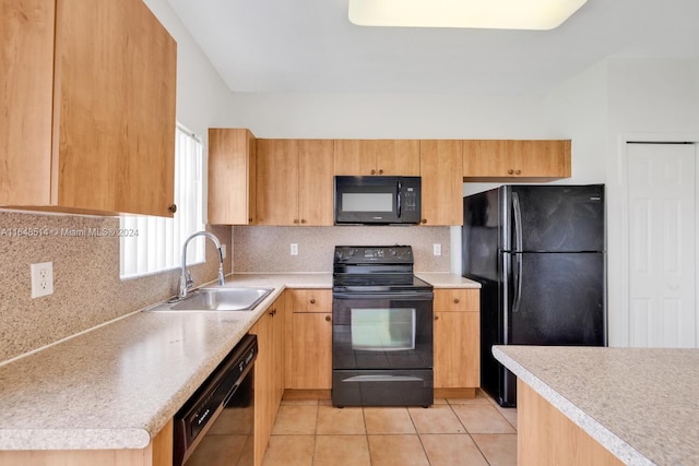 kitchen with sink, decorative backsplash, light brown cabinetry, light tile patterned floors, and black appliances