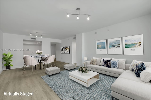 living room with wood-type flooring