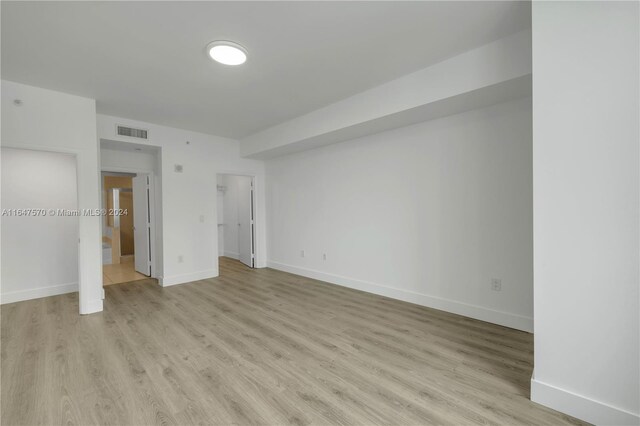 unfurnished bedroom featuring light hardwood / wood-style floors