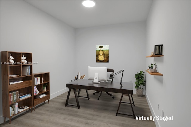 home office featuring light wood-type flooring