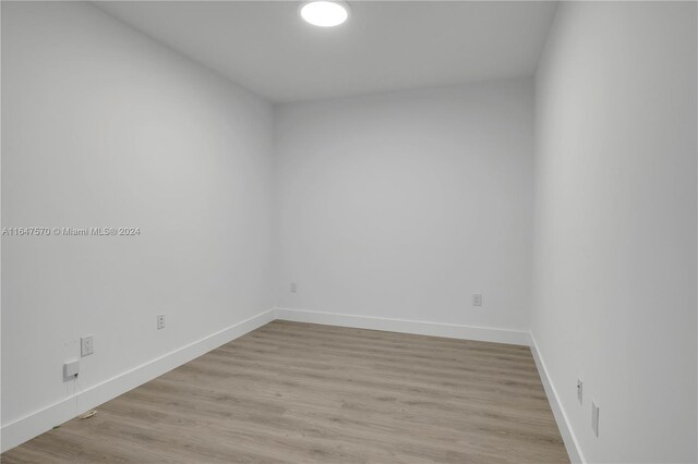 unfurnished room featuring light wood-type flooring