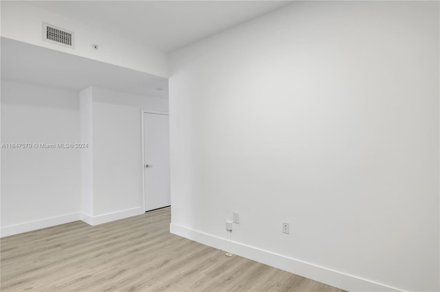 empty room featuring light hardwood / wood-style floors