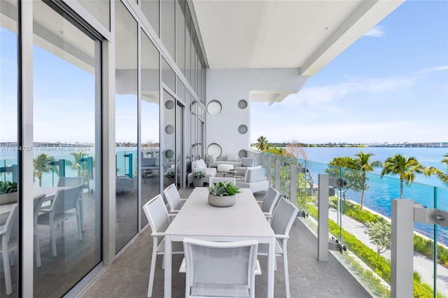 balcony featuring a water view