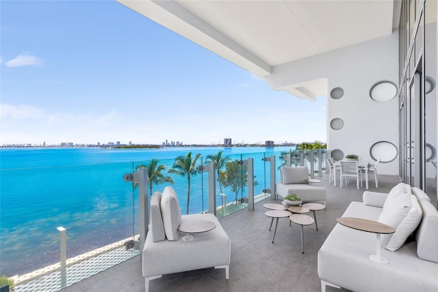 balcony featuring a water view