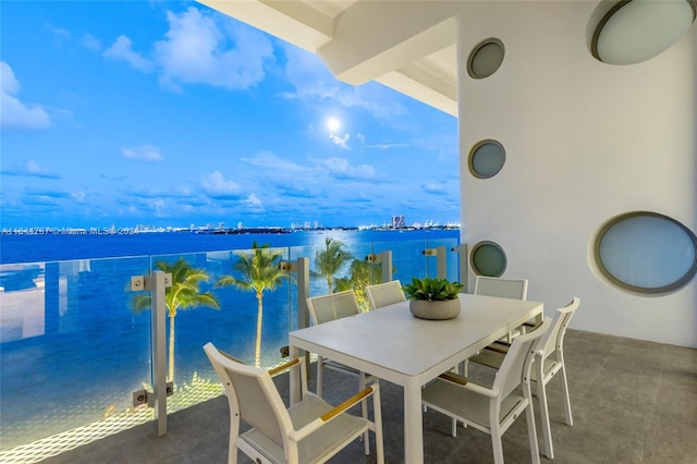 balcony featuring a water view