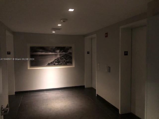 empty room featuring elevator