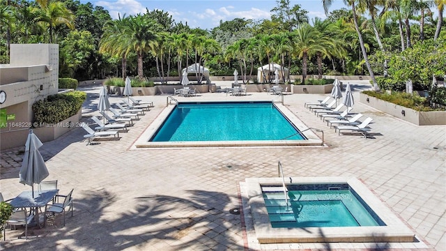 pool featuring a patio area