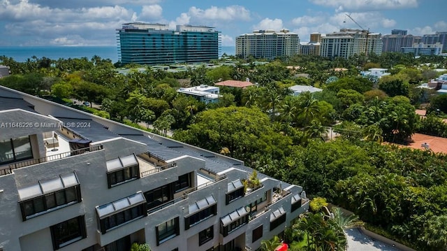 bird's eye view with a view of city and a water view