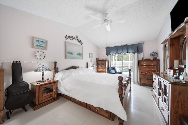 bedroom featuring vaulted ceiling, light tile patterned floors, a textured ceiling, and a ceiling fan