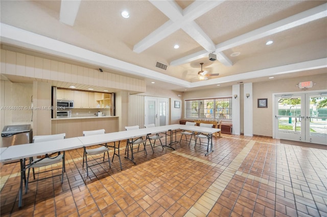 dining area featuring recessed lighting, visible vents, beamed ceiling, and french doors