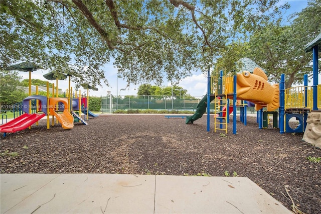 community playground featuring fence