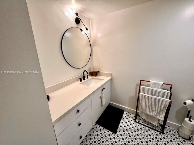 bathroom featuring tile patterned floors and vanity