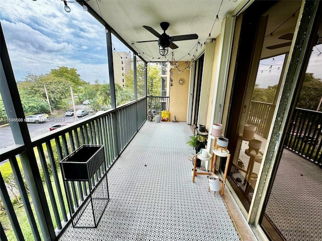 balcony featuring ceiling fan