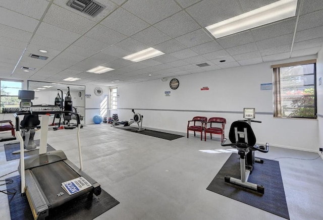 workout area with a drop ceiling