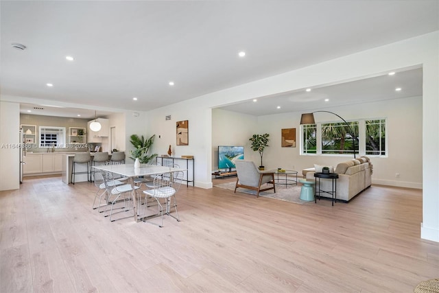 dining room featuring light hardwood / wood-style floors