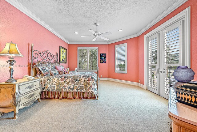 bedroom featuring a textured ceiling, access to outside, ceiling fan, and carpet flooring