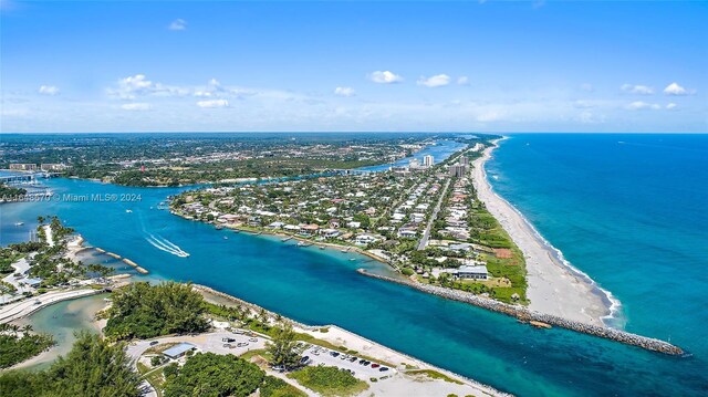 aerial view with a beach view and a water view