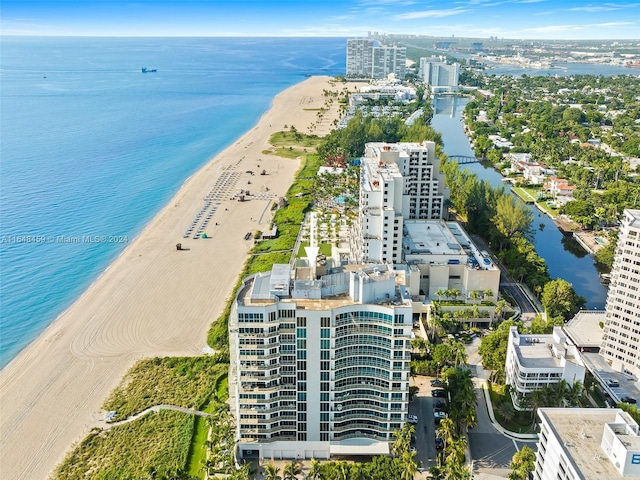 aerial view featuring a beach view and a water view