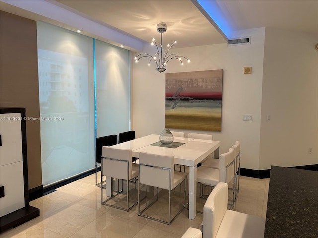 dining area with a chandelier