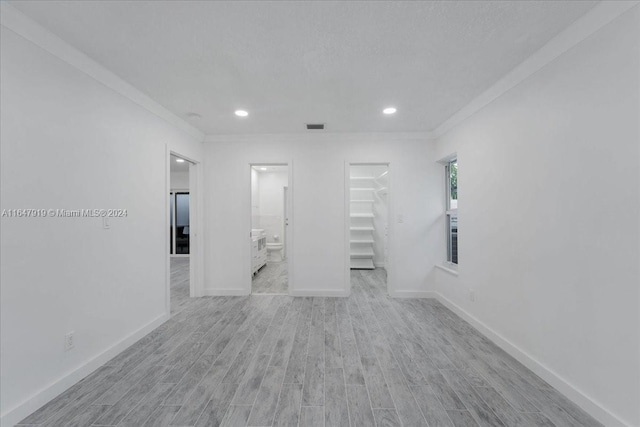150 SE 3rd Ave, Dania Beach, FL 33004 - unfurnished room with wood finished floors, crown molding, and recessed lighting