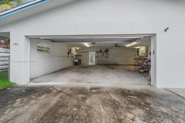 150 SE 3rd Ave, Dania Beach, FL 33004 - garage featuring concrete driveway
