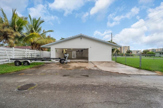 view of side of home with a lawn