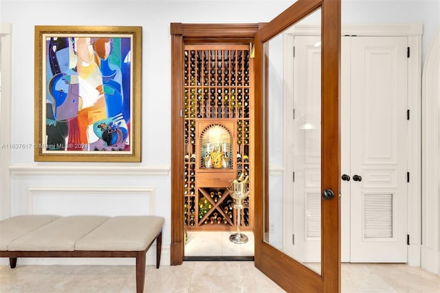 wine cellar featuring light tile patterned flooring