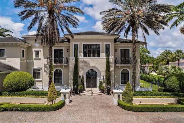 mediterranean / spanish house with a balcony