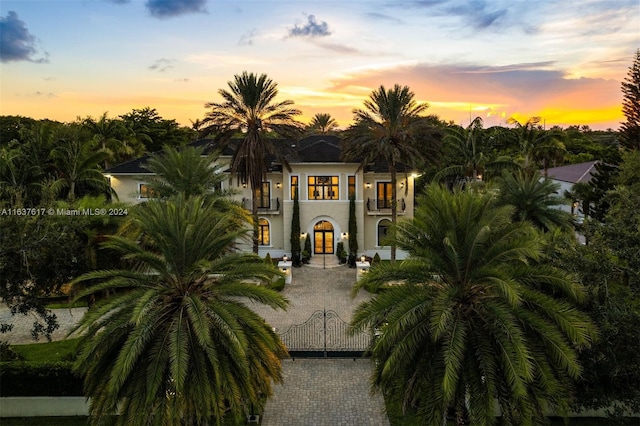 mediterranean / spanish-style home featuring a balcony