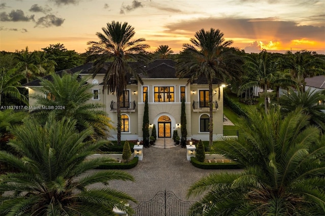 mediterranean / spanish-style home with a balcony