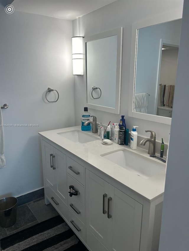 bathroom with vanity and tile patterned floors