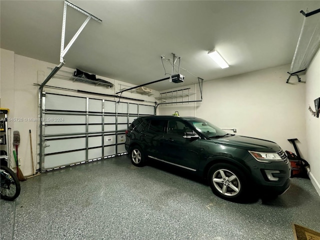 garage featuring a garage door opener