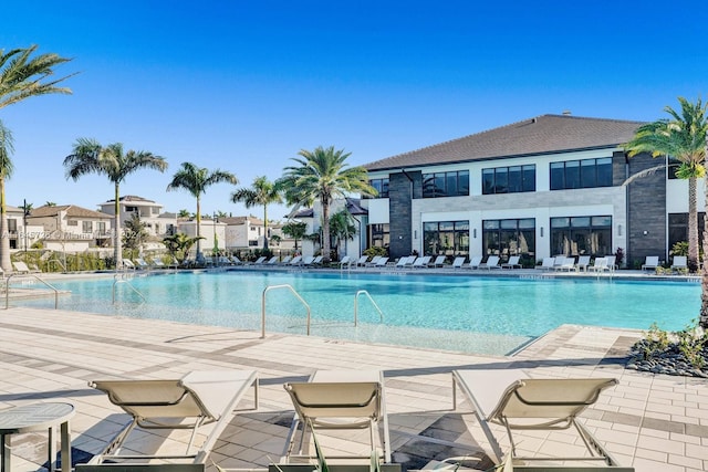 view of swimming pool featuring a patio